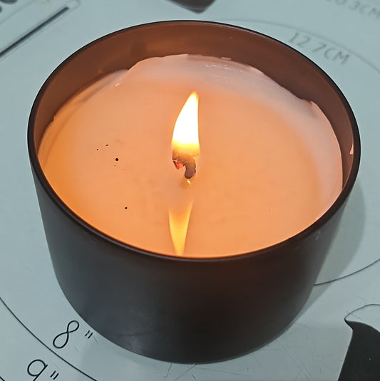 A candle made by The Original Candle Co. with a perfect burn and flame.