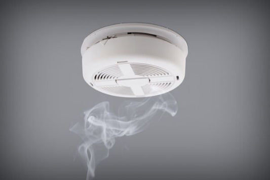 Will burning candles set off a smoke alarm? Blog post from The Original Candle Company.