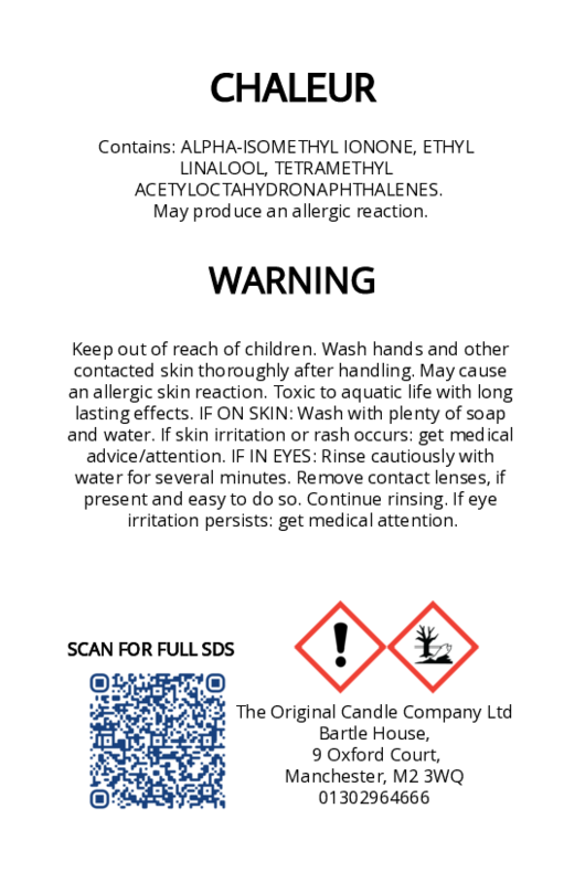 Warning label for a product containing chemicals with contact information and QR code. The original candle co.