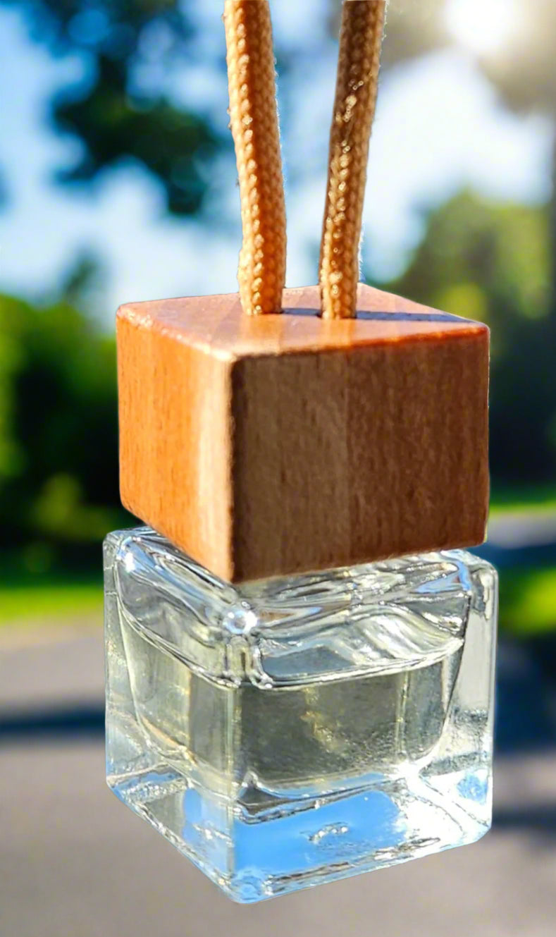 Expertly crafted by The Original Candle Company, this hand-blended car fragrance diffuser is elegantly showcased hanging, highlighting its stylish design and effortless scent diffusion for a luxurious driving experience