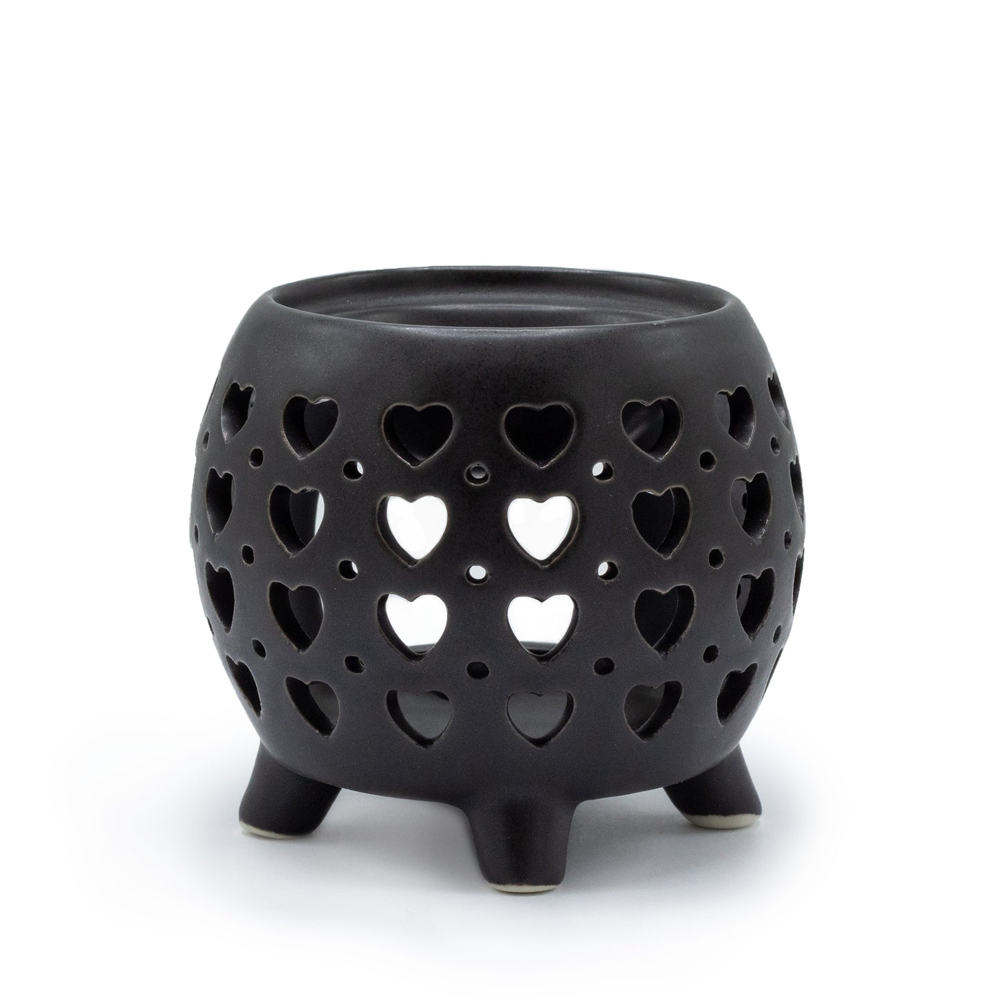 Carefully sourced by The Original Candle Company and featuring a squat pot style with multi heart cut-out pattern in matt black, this oil burner and wax warmer will make an attractive decoration in any room.