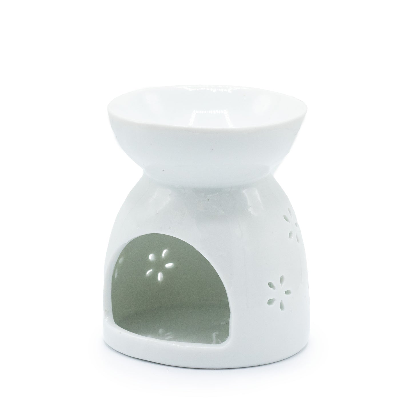 Carefully sourced by The Original Candle Company and featuring a cut-out Buddha design in white, this oil burner and wax warmer will make an attractive decoration in any room. Image shows the rear of the burner where the tealight goes.