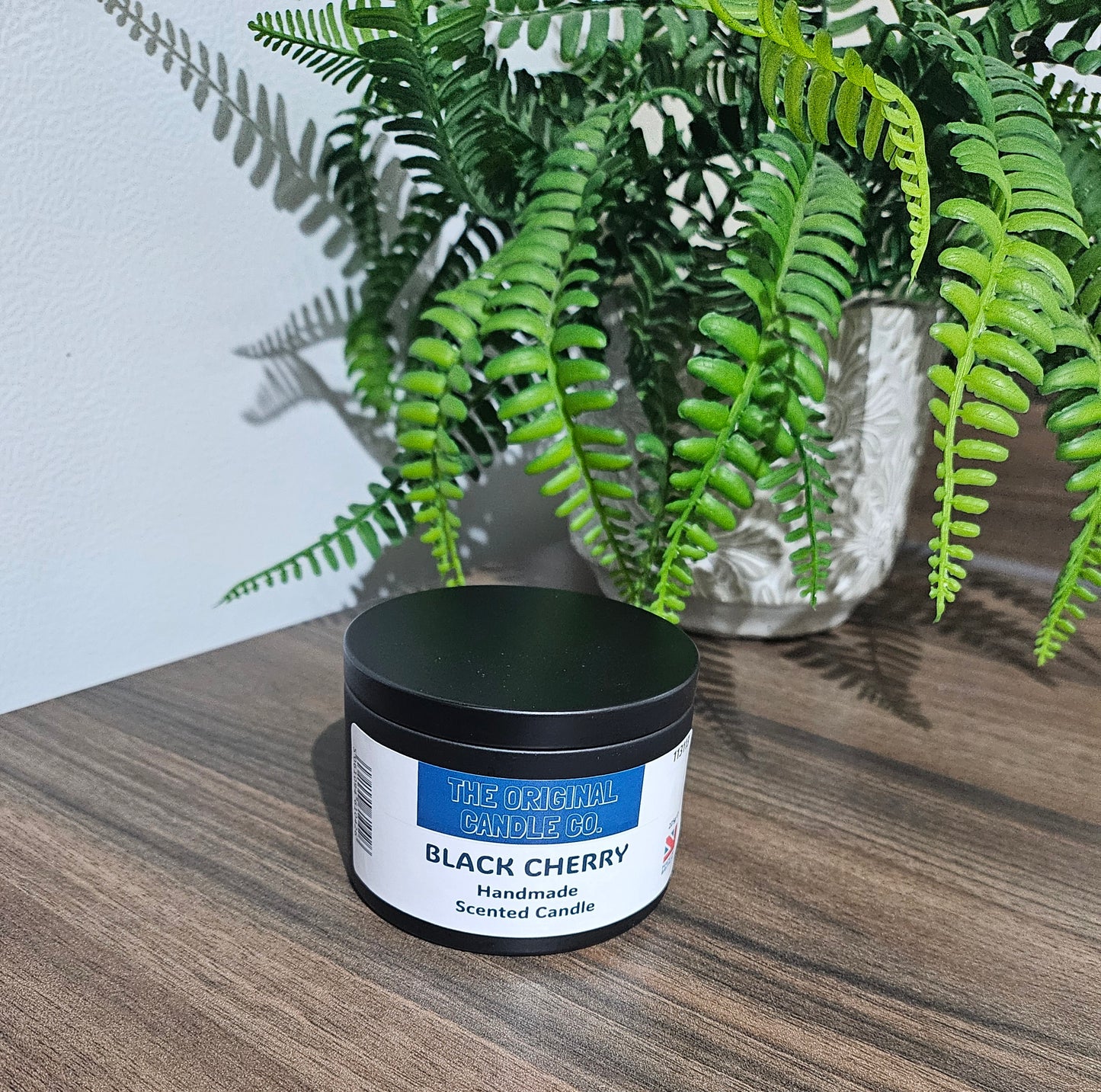 Black cherry candle featuring a rich, fruity scent with deep, luscious notes of ripe cherries and a smooth, sweet finish. Beautifully crafted for a bold fragrance experience.