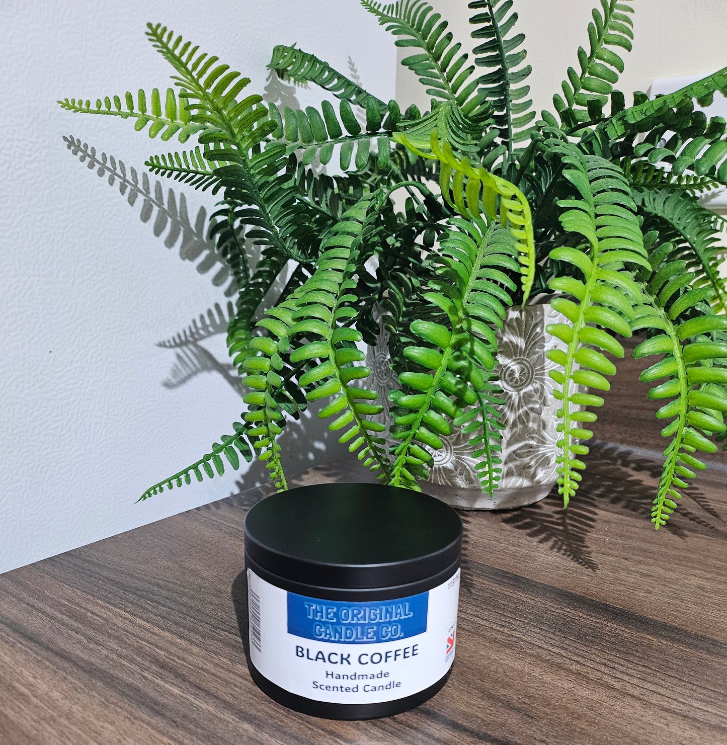 Black coffee candle featuring deep roasted coffee notes with a touch of creaminess and velvety cocoa for a warm, indulgent fragrance. Perfectly crafted for a bold scent experience.