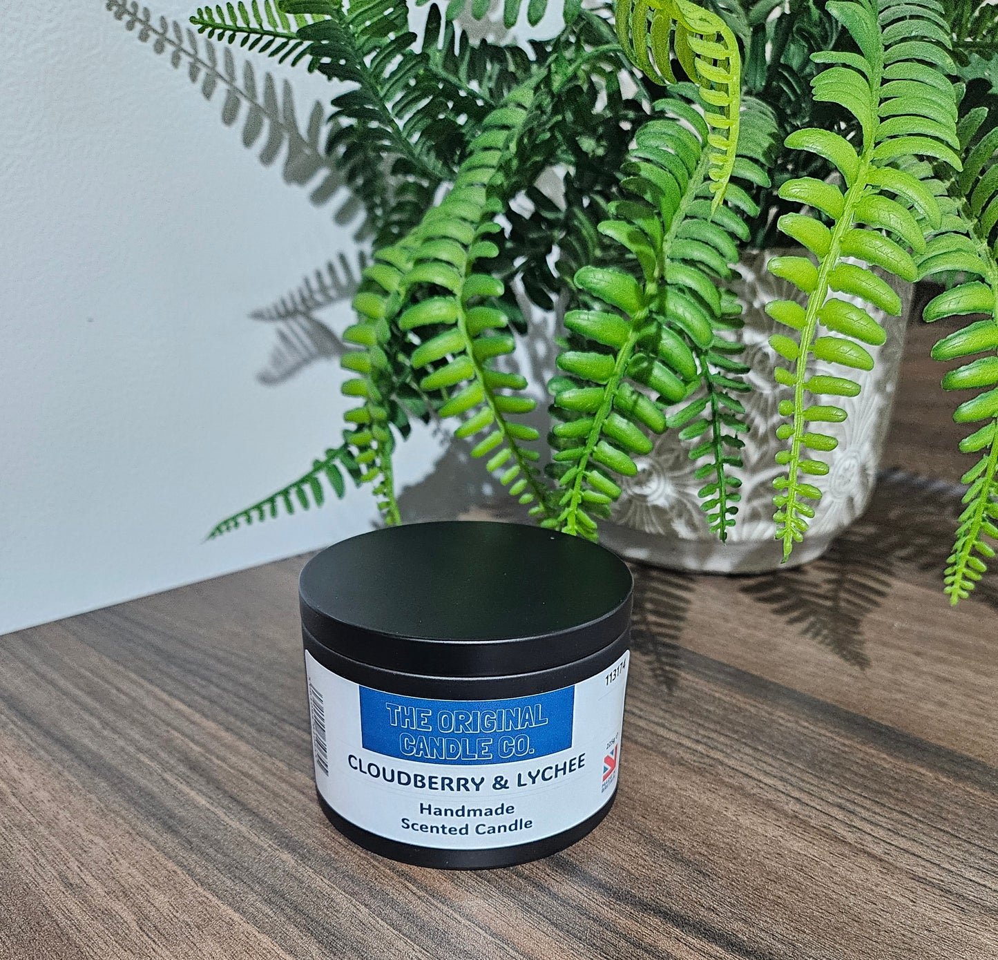 Cloudberry & Lychee candle infused with zesty citrus, lush berries, and soft musk, creating a vibrant and refreshing fragrance experience. Beautifully crafted for a premium scent throw.