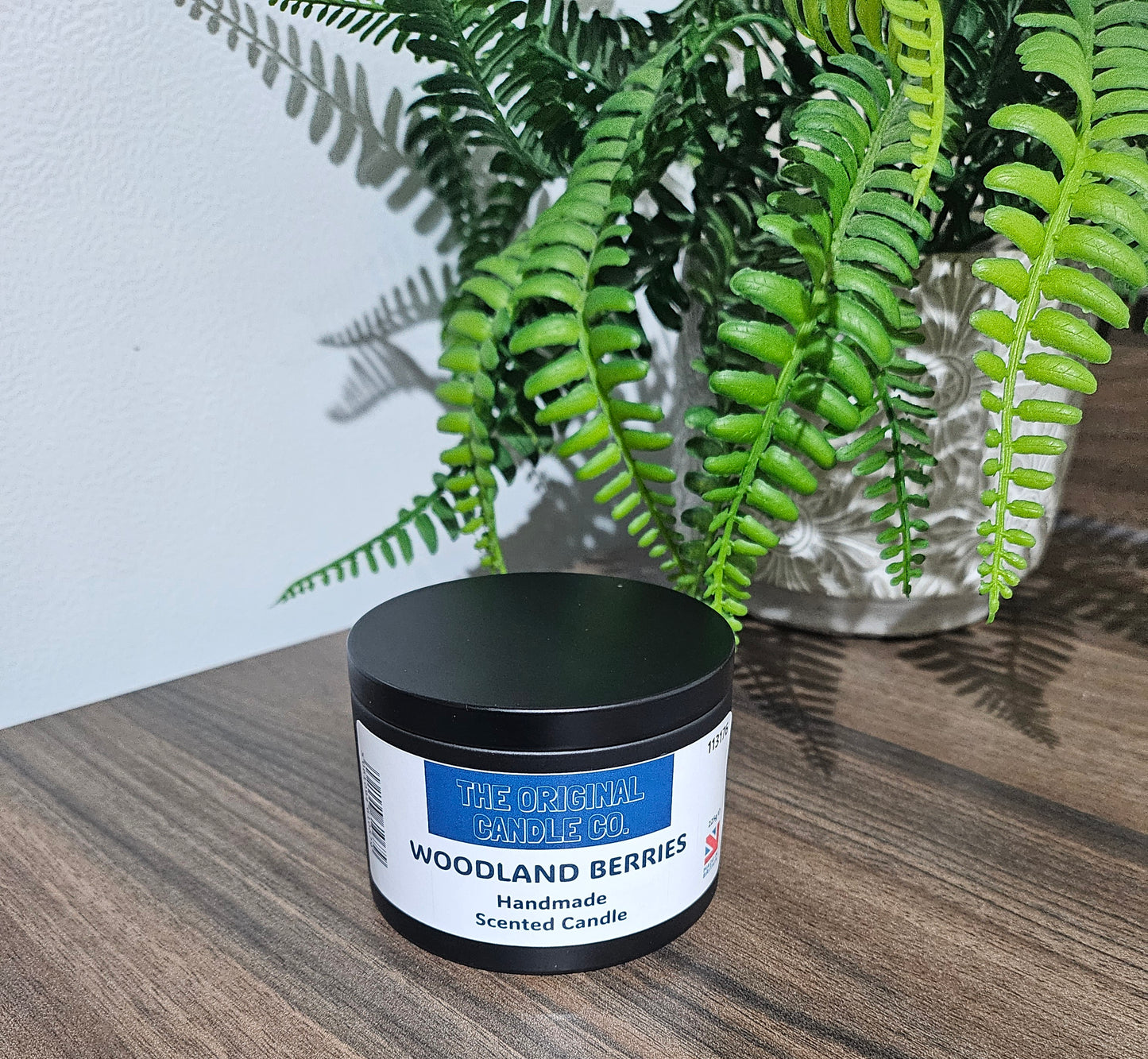 Expertly crafted by The Original Candle Company,this oodland Berries scented candle in a black tin is infused with juicy blackcurrant, raspberry, and fig, creating a rich and fruity fragrance experience.