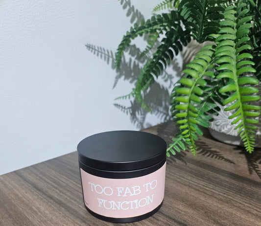 Expertly crafted by The Original Candle Company, this 161g vanilla handmade insult candle black tin with the phrase "Too Fab To Function" delivers an opulent and captivating aroma, designed to refresh any space with refined and indulgent fragrance notes of vanilla whilst offering a source of insult and humour.
