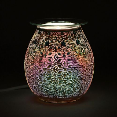Carefully sourced and selected by The Original Candle Company, this electric oil burner and wax warmer is shown glowing, highlighting its captivating 3D geometric flower design while seamlessly diffusing fragrance for a warm and inviting home ambiance.