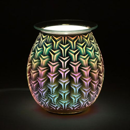 Carefully sourced and selected by The Original Candle Company, this electric oil burner and wax warmer is displayed glowing, highlighting its striking 3D geometric pattern while effortlessly enhancing home ambiance with luxurious fragrance.