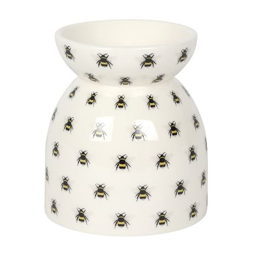 Carefully sourced and selected by The Original Candle Company, this oil burner and wax warmer is displayed from the front, showcasing the spacious dish for effortless wax melting or essential oil diffusion with a charming bee print design.