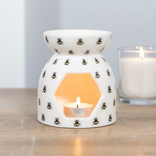 Carefully sourced and selected by The Original Candle Company, this oil burner and wax warmer features an elegant all-over bee print, adding a touch of nature-inspired charm while effortlessly diffusing luxurious fragrance.