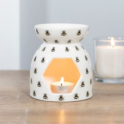 Carefully sourced and selected by The Original Candle Company, this oil burner and wax warmer features an elegant all-over bee print, adding a touch of nature-inspired charm while effortlessly diffusing luxurious fragrance.