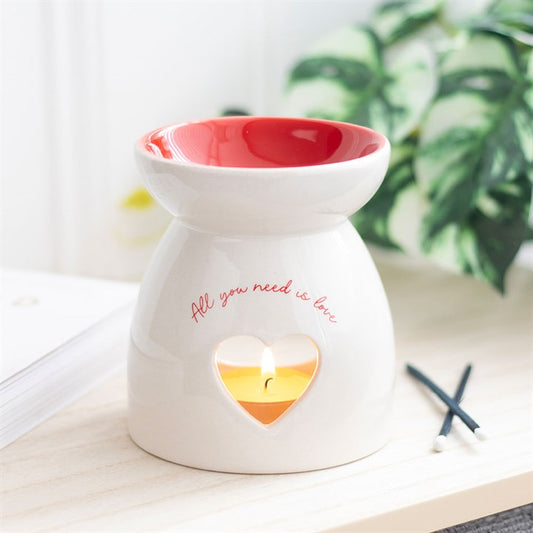 Carefully sourced and selected by The Original Candle Company, this heart-shaped oil burner and wax warmer features a charming “All You Need is Love” inscription, creating a warm and inviting atmosphere with effortless fragrance diffusion.