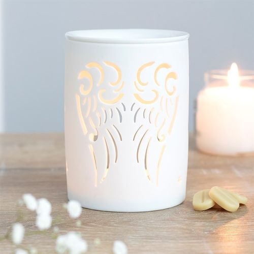 Carefully sourced by The Original Candle Company. This white ceramic oil burner and wax warmer features cutout angel wings in a cute, contemporary design. Place fragrance oil or wax melts into the built-in dish with a standard tealight inside to fill the home with calming fragrance.
