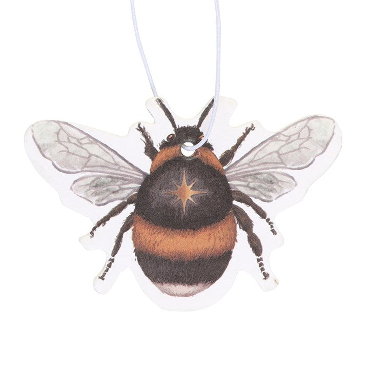 Honey fragranced car air freshener in a been shape without the outer packaging.
