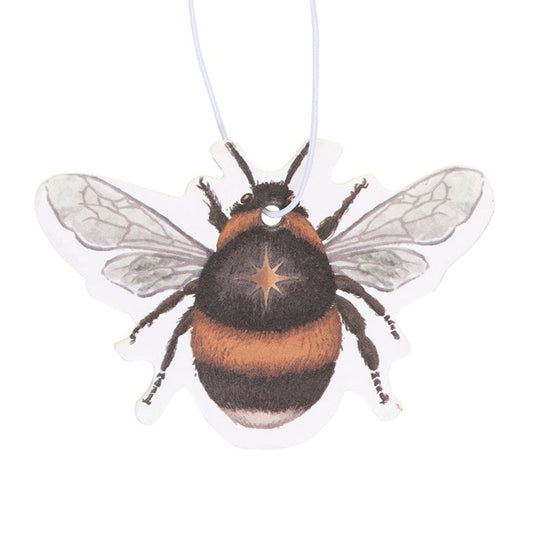 Honey fragranced car air freshener in a been shape without the outer packaging.