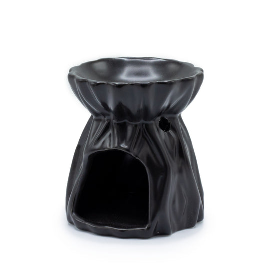 Carefully sourced by The Original Candle Company and featuring a geometric design with a highly decorative glaze in black, this oil burner and wax warmer will make an attractive decoration in any room. Image shows the tealight cut-out at the rear of the product.