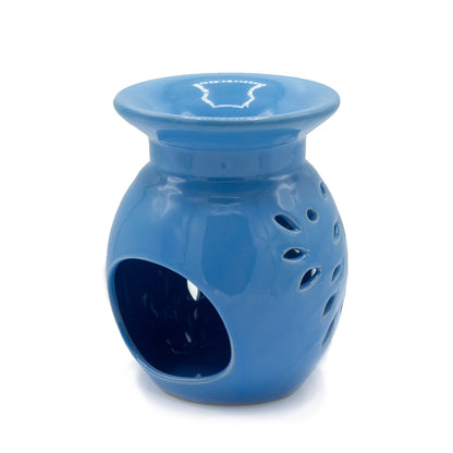 Carefully sourced by The Original Candle Company, this vibrant blue floral oil burner showcases a delicate cut-out bloom design from the tealight cut-out side bringing warmth and elegance to any space. Perfect for diffusing essential oils or melting wax, it enhances home ambience with a cheerful, botanical touch.
