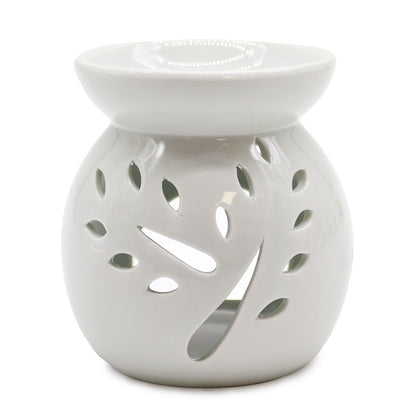 Carefully sourced by The Original Candle Company, this classic oil burner features a crisp white finish and an elegant tree cut-out design. Perfect for diffusing essential oils or melting wax, it creates a warm and inviting atmosphere with timeless charm.