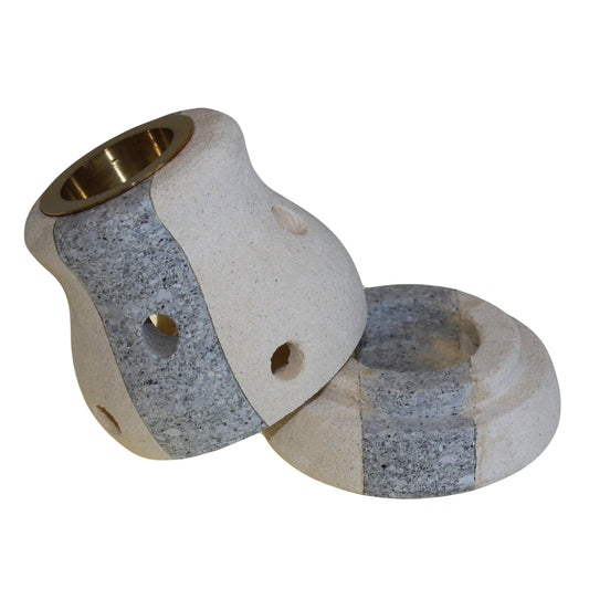 Carefully sourced by The Original Candle Company, this combo-shaped sandstone oil burner features a grey stripe accent and a lifted top, showcasing its tealight base for effortless use. Designed for both essential oils and wax melts, it blends refined aesthetics with practical functionality.