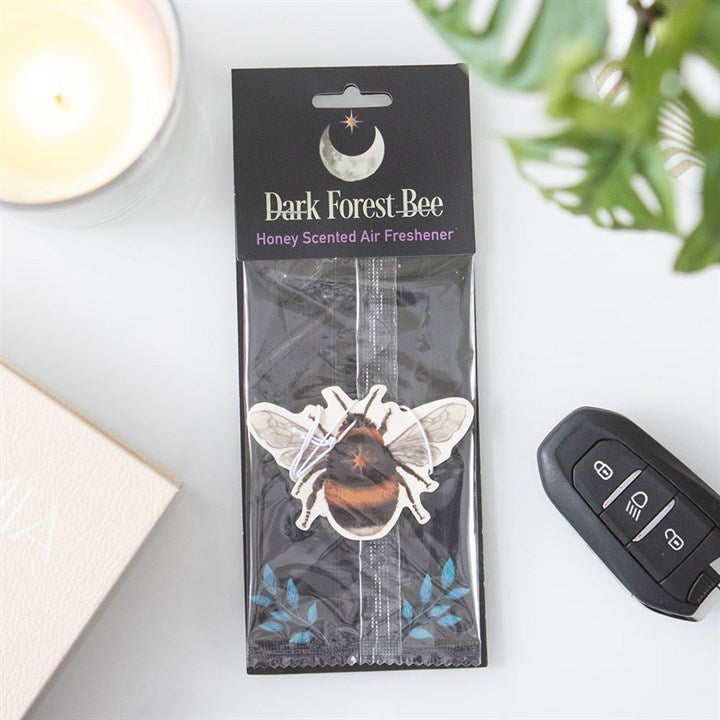 Bee design car air freshener inside its outer packaging.