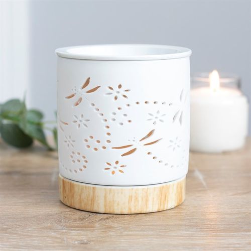 This matte ceramic oil burner and wax warmer has a pretty dragonfly detail and a ceramic base with a wood-effect finish giving it a contemporary feel.