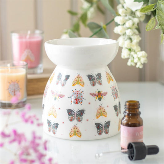 In its classic shape with stunning bug floral details this oil burner carefully selected by The Original Candle Company will make the perfect statement.
