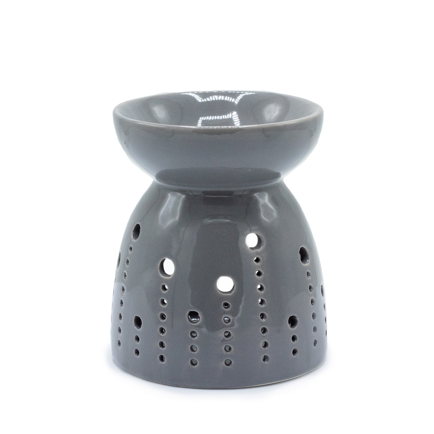 Carefully sourced by The Original Candle Company. A classic style oil burner and wax warmer featuring a bubble cut-out design in a grey glaze, this oil burner and wax warmer will make an attractive decoration in any room.