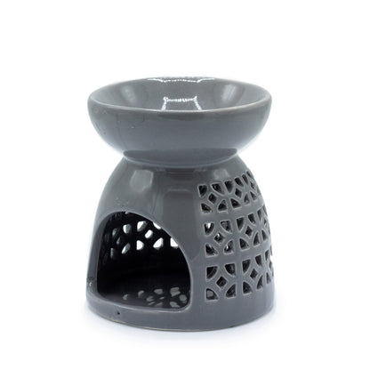 Carefully sourced by The Original Candle Company a classic style oil burner and wax warmer featuring a teardrops cut-out design in a grey glaze, this oil burner and wax warmer will make an attractive decoration in any room.