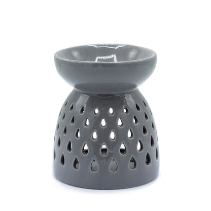 Carefully sourced by The Original Candle Company. A classic style oil burner and wax warmer featuring a teardrops cut-out design in a grey glaze, this oil burner and wax warmer will make an attractive decoration in any room.