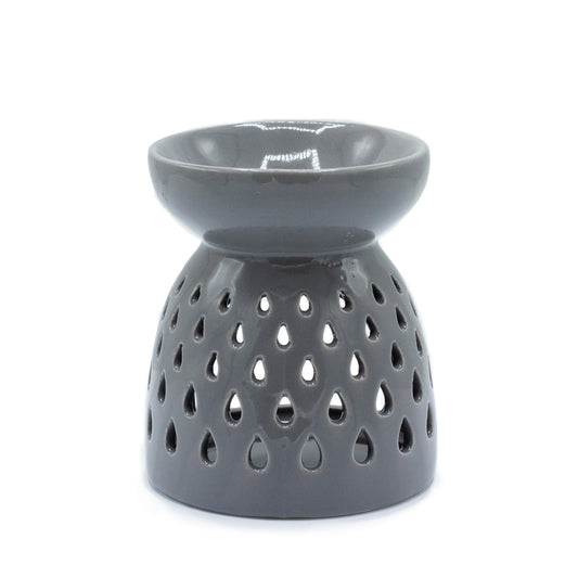 Carefully sourced by The Original Candle Company. A classic style oil burner and wax warmer featuring a teardrops cut-out design in a grey glaze, this oil burner and wax warmer will make an attractive decoration in any room.
