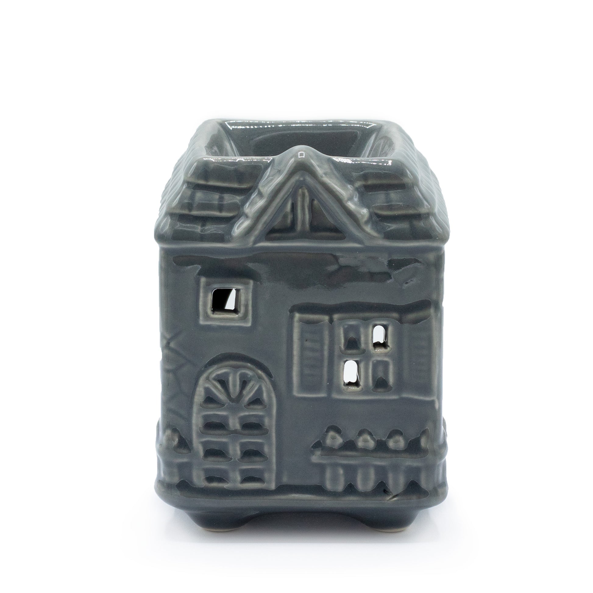 Carefully sourced by The Original Candle Company. A small oil burner & wax warmer featuring a townhouse in a grey glaze, this oil burner and wax warmer will make an attractive decoration in any room.