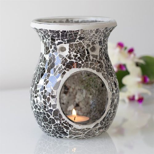 Stunningly detailed this crackle glass oil burner and wax warmer in gun metal grey will compliment any home.