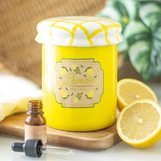 In a vibrant yellow with a beautiful label motive and checker board removable lid. This specially curated oil burner and wax warmer from The Original Candle Company will be a perfect addition to any home.