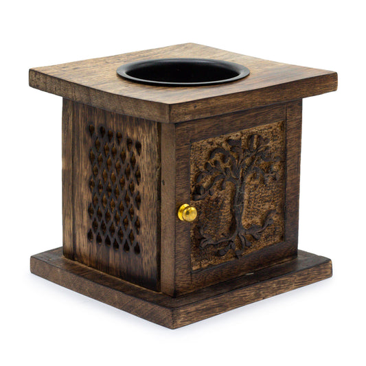 Carefully sourced by The Original Candle Company, this stunning large mango wood oil burner features a beautifully carved Tree of Life design. Perfect for diffusing essential oils or melting wax, it brings warmth, natural elegance, and spiritual symbolism to any cosy home ambience.
