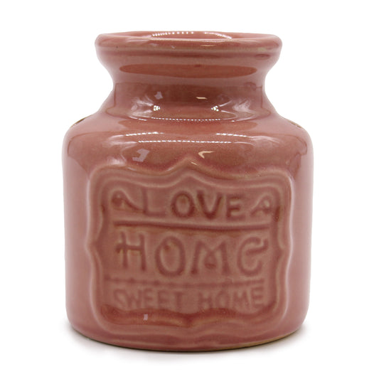 Carefully sourced by The Original Candle Company, this elegant large red oil burner features a 'Home Sweet Home' embossed design, bringing warmth and charm to any space. Perfect for diffusing essential oils or melting wax, it creates a cosy and inviting atmosphere with a touch of timeless elegance.
