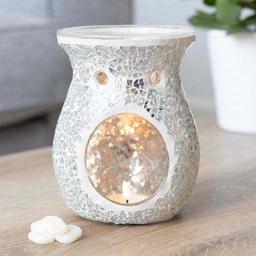 Stunningly designed this crackle glass oil burner and wax warmer in a silver crackled glass will be a great addition to any decor.