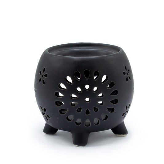 Carefully sourced by The Original Candle Company and featuring a squat pot style with flower purst pattern in matt black, this oil burner and wax warmer will make an attractive decoration in any room.
