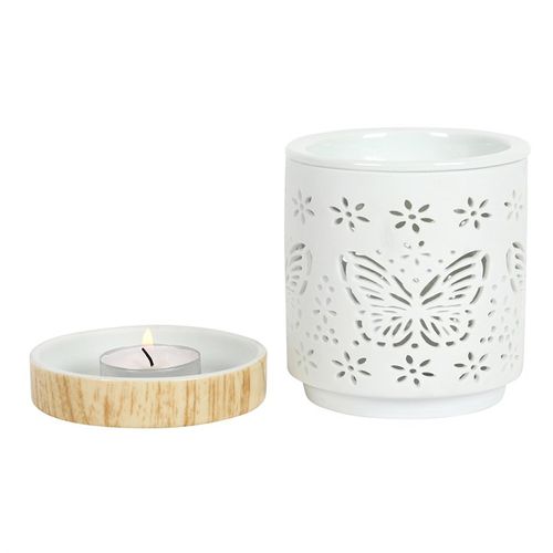 Featuring an intricate butterfly cut-out design, this oil burner and wax warmer is sure to evoke a sense of style in any room. With its wood effect tealight holding base it add a sense of quality without the price tag.