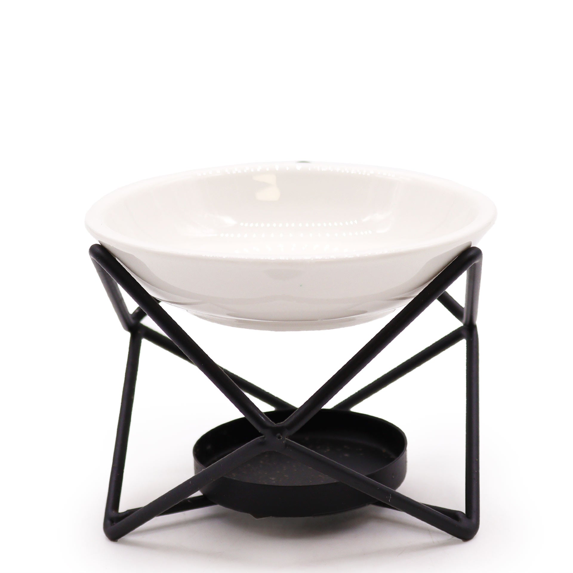 Carefully sourced by The Original Candle Company, this modern oil burner features a striking black hexagonal stand with a white removable ceramic warming dish. Designed for essential oils and wax melts, it blends sleek contemporary aesthetics with effortless functionality.