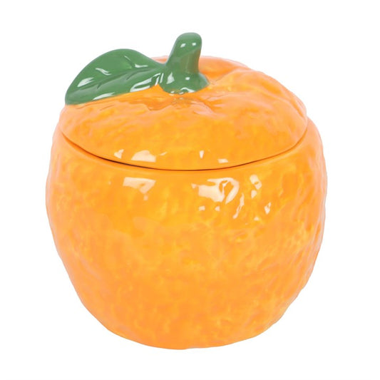 This beautifully crafed vibrant orange oil burner and wax warmer in the style of a juicy orange is sure to evoke a sense of zest in any room. With its stalk and leaf design on the lid which is removable it is sure to please anyone who loves the look and taste of oranges.