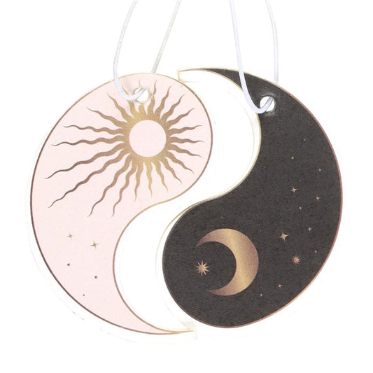 Vanilla scented car air fresheners pack of 2 Yin Yang themed deipicting the sun and moon without the outer packaging.