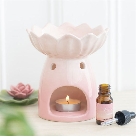 Specially chosen by The Original Candle Company this stunningly designed oil burner and wax warmer brings a touch of nature's grace into the home with this pink water lily ceramic design. The delicate style of this burner makes a beautiful addition to any room. Perfect for infusing your space with calming scents.