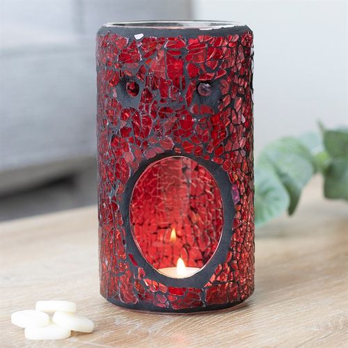 This pillar shaped crackle glass oil burner and wax warmer curated by The Original Candle Company evokes a sense of style while also being minimalist and blending quietly into the background. This image shows the rear of the product where the tealight will go.