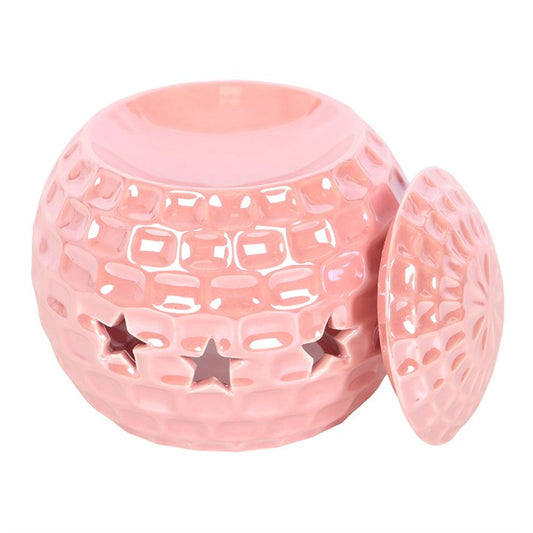 This stunningly designed pink disco ball oil burner and wax warmer is sure to delight those with a flare for all things 70's or pink. Show here with its removable lid to hightlight where the fragrance oils or wax melts sit and highlighting its 3 star cut-out style.