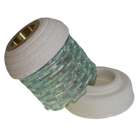 Carefully sourced and selected by The Original Candle Company, this round glass oil burner is shown lifted from its sandstone brick base, highlighting its removable design for effortless cleaning and seamless wax melting.