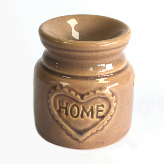 Carefully sourced by The Original Candle Company, this charming small beige oil burner features a subtle 'Home' embossed design, adding warmth and comfort to any space. Perfect for diffusing essential oils or melting wax, it creates a soothing and inviting atmosphere.