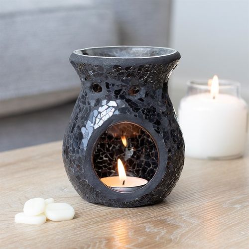 Beautifully crafted and curated by The Original Candle Company, this stunning black crackle glass oil burner & wax warmer will add a touch of elegance to any home.