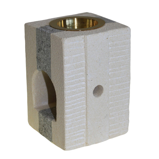 Carefully sourced by The Original Candle Company, this square sandstone oil burner features a sleek grey stripe accent and a stylish cut-out design. Perfect for diffusing essential oils or melting wax, it combines elegance and functionality for a refined home ambiance.