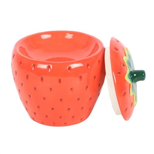 Carefully sourced by The Original Candle Company. This bright red strawberry-themed, novelty oil burner and wax warmer, makes for a fun and vibrant addition to any space and is perfect for infusing with favourite scents. Its playful design adds a touch of whimsy to home decor, making it both functional and decorative. Always remove the lid whilst in use as shown in this image.